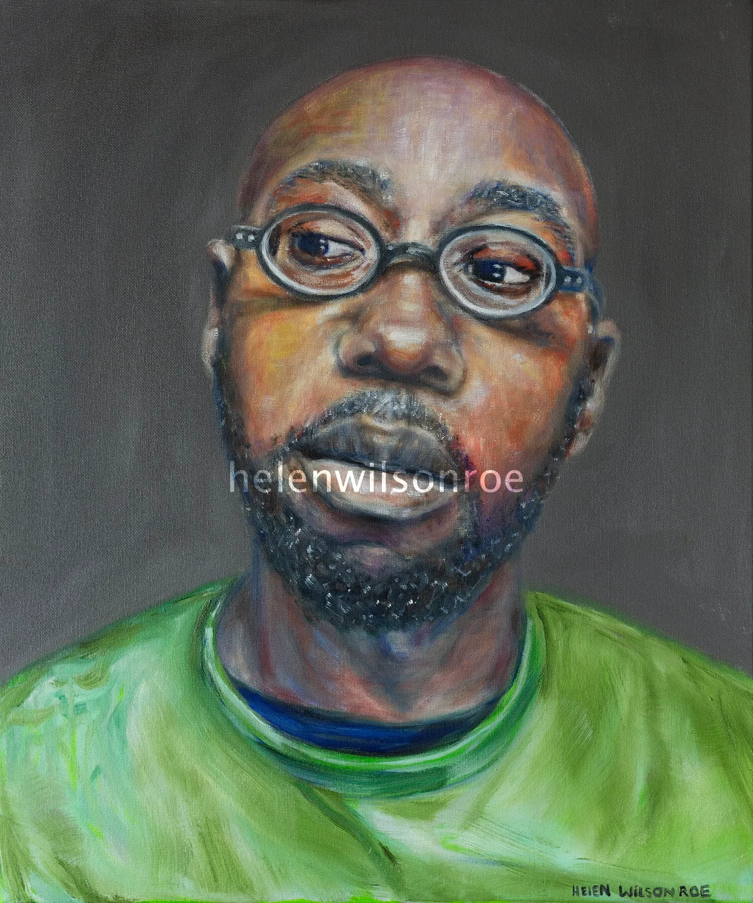 Oil portrait of Kevin Brown, a bald man wearing round glasses and a green top